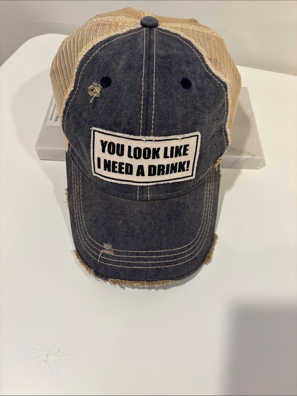 Distressed Patch Trucker Hat - "You Look Like I Need A Drink!" - Black & Tan